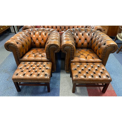 435 - A pair of brown upholstered Chesterfield style armchairs, together with a pair of matching stools (4... 