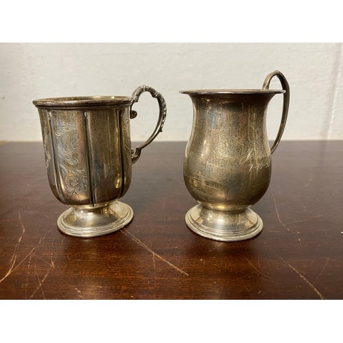 105 - Two silver christening mugs, both Birmingham 1993, both engraved -