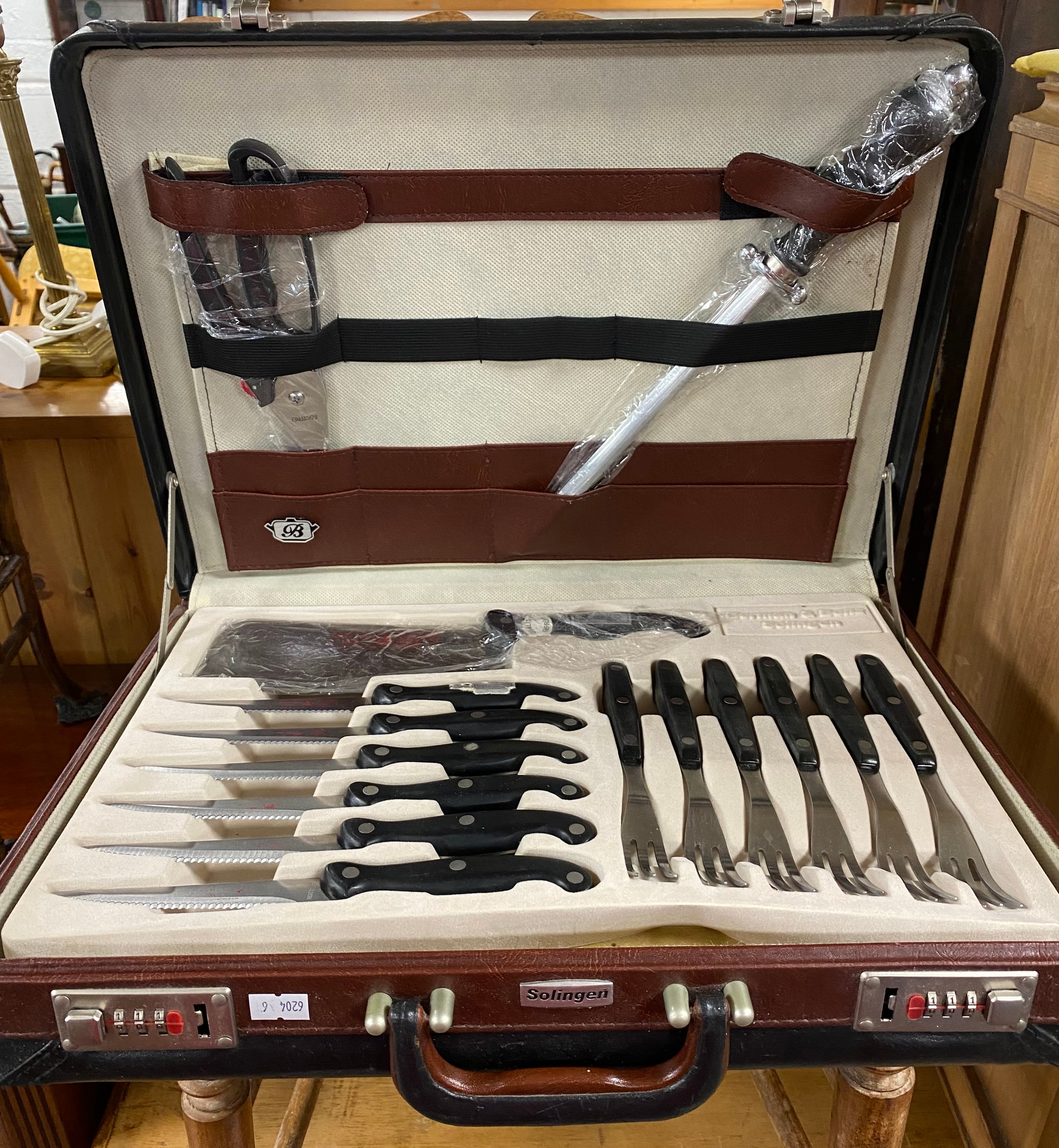 A cased Solingen carving steak knife set