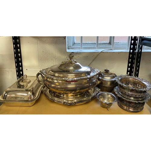 96 - A silver plated tureen and cover, together with a pair of bottle coasters, pair of serving dishes an... 