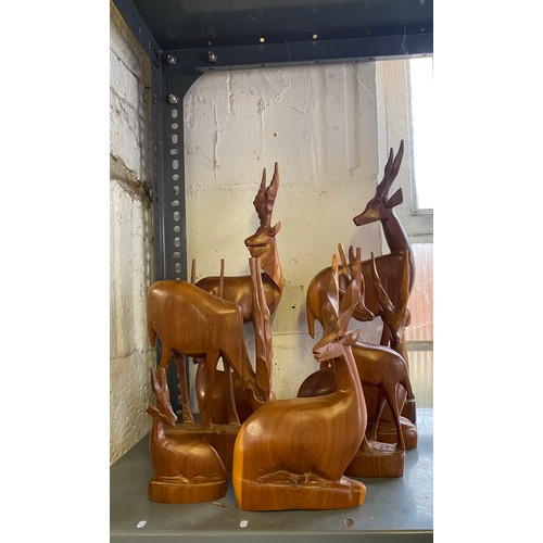 268 - A group of seven hardwood carvings of gazelles -