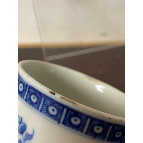 161 - A blue and white teacup and saucer, together with two teapots (lacking covers) and other teawares -