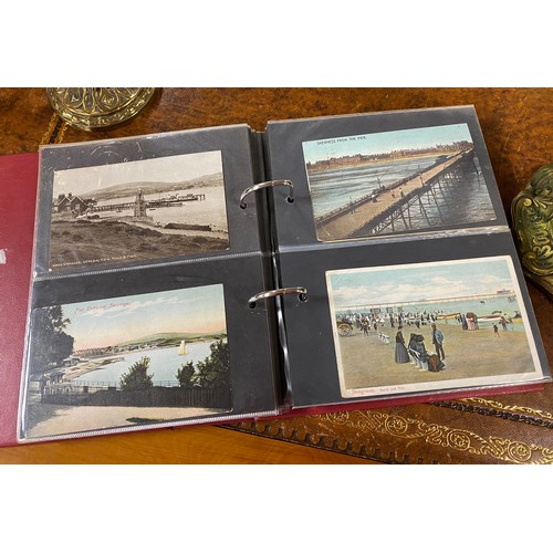 165 - Postcards: an album of approximately 125 postcards, mostly piers -