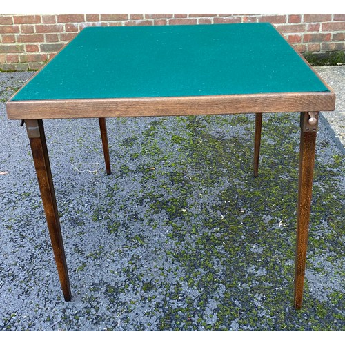 259 - An early 20th century folding games table, together with a pair of modern hardwood stools/lamp table... 