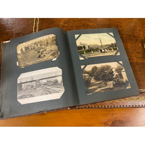 175 - Postcards: An album of approximately 125 postcards, to include R P, railway accidents, fire, militar... 