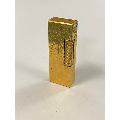 21 - A gold plated Dunhill lighter -