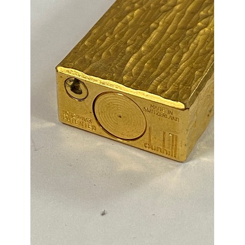 21 - A gold plated Dunhill lighter -