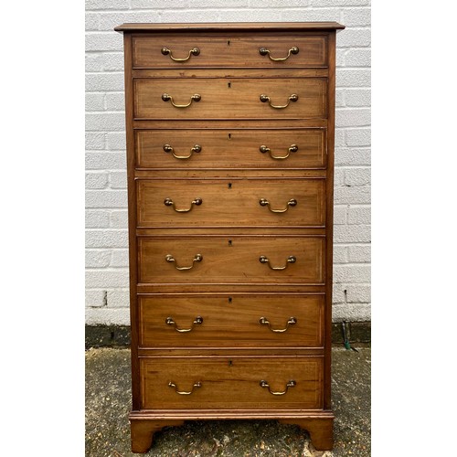 285 - A mahogany and inlaid tall chest, fitted with seven graduated long drawers -