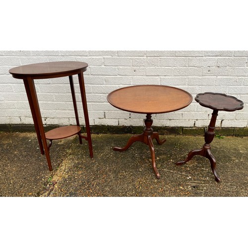 286 - A group of small furniture items, comprising a circular topped table, oval two tier table and a wine... 