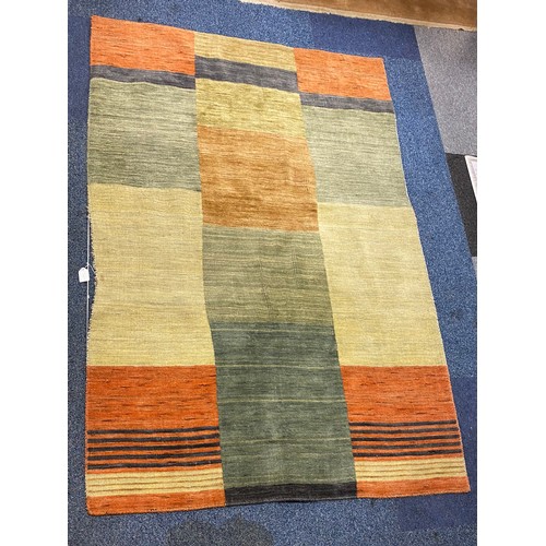 289 - A contemporary rug, approximately 185 x 120cm -