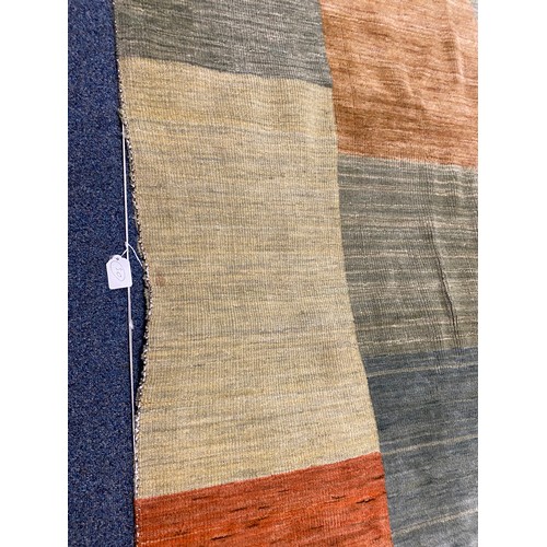 289 - A contemporary rug, approximately 185 x 120cm -