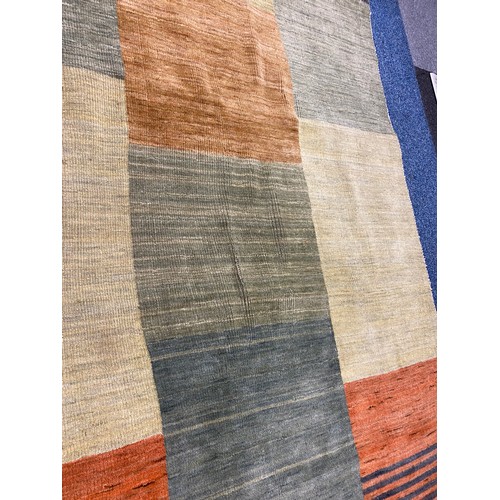 289 - A contemporary rug, approximately 185 x 120cm -