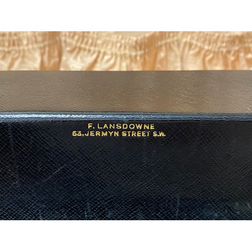 209 - A leather dressing case, by F Lansdowne, Jermyn Street, London, with 'secret' drop down compartment ... 