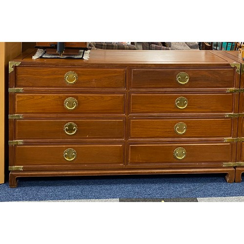 300 - A reproduction campaign style chest, of eight drawers, with brass mounts -