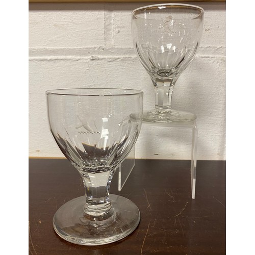 111 - A pair of 19th century goblets, each bowl with crest engraving -