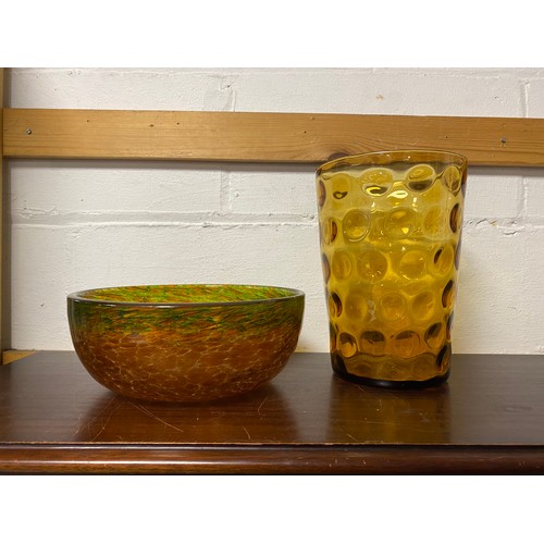 120 - A Monart style glass bowl, with orange, green and gold flecked body, together with an amber glass va... 