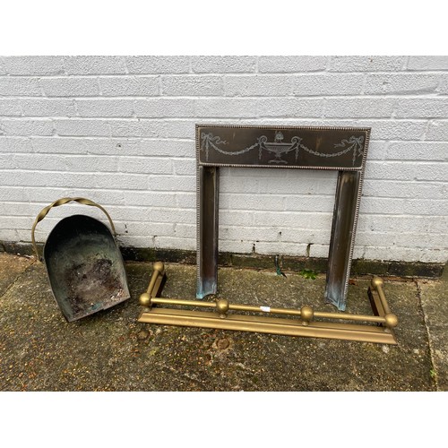 324 - A nursery fireplace, together with a brass fender and a scuttle (3) -