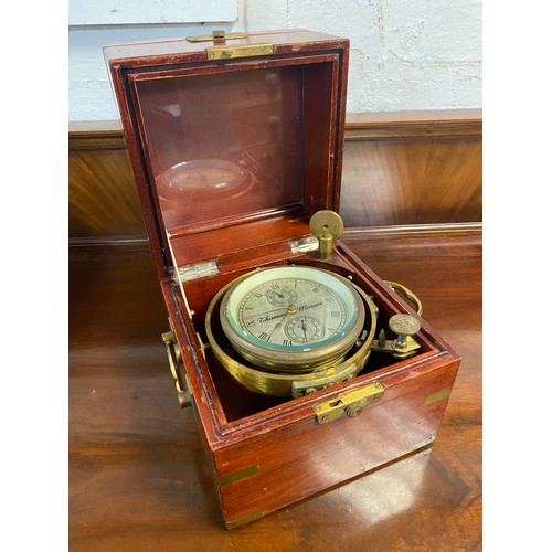 254 - A brass and mahogany cased chronometer, the steel dial signed for Thomas Merser -