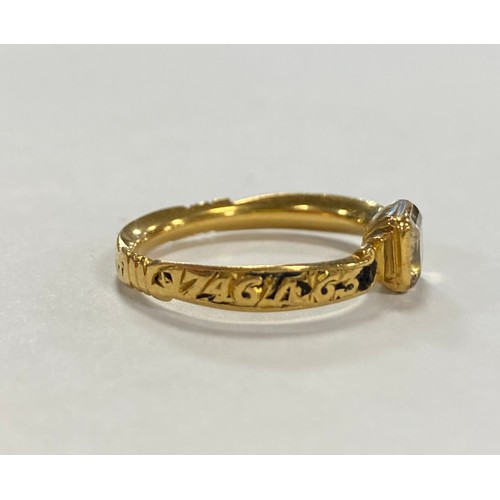 52 - An 18th century enamel and gold mourning ring, dated 1746, with rock crystal panel to front -