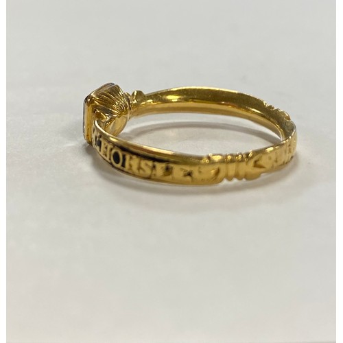 52 - An 18th century enamel and gold mourning ring, dated 1746, with rock crystal panel to front -