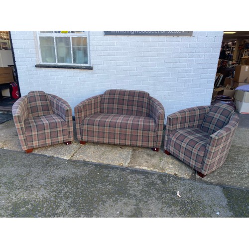 333 - A modern three piece suite, of small size, upholstered in tartan -