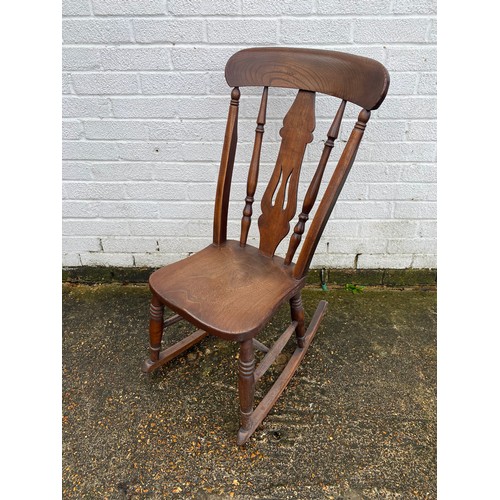 342 - An elm rocking chair -