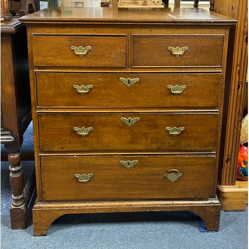 350 - An early 19th century oak chest of drawers, fitted with two short and three long drawers, on bracket... 