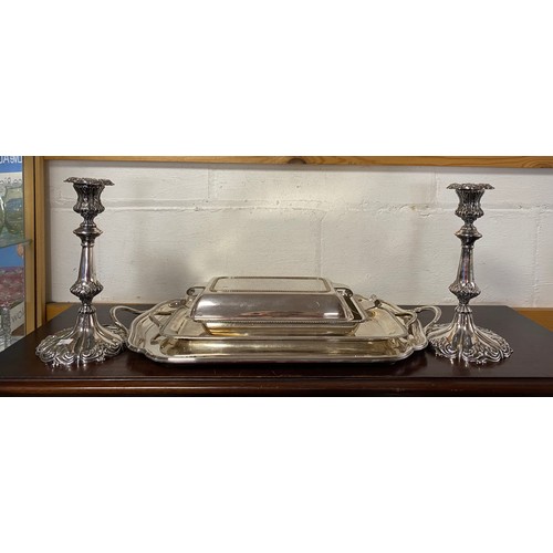 31 - A silver plated two handled tray, together with a smaller tray, a serving dish and cover and a pair ... 