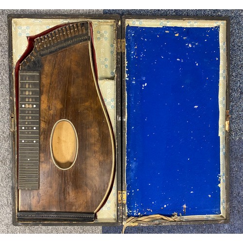 242 - A cased violin together with a cased zither -