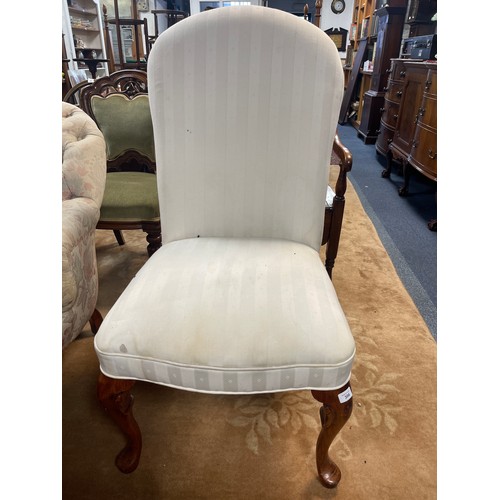 306 - A high back side chair, on cabriole legs -