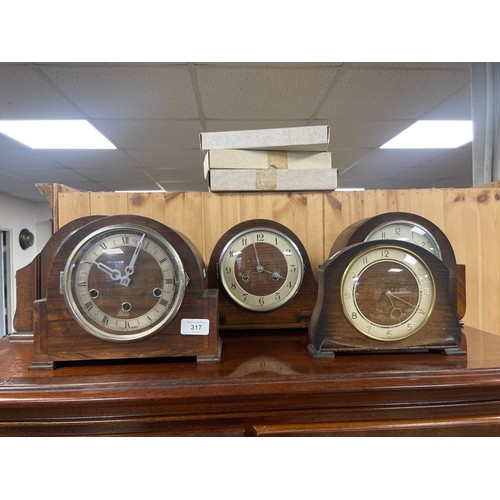 317 - A group of five mantel clocks -