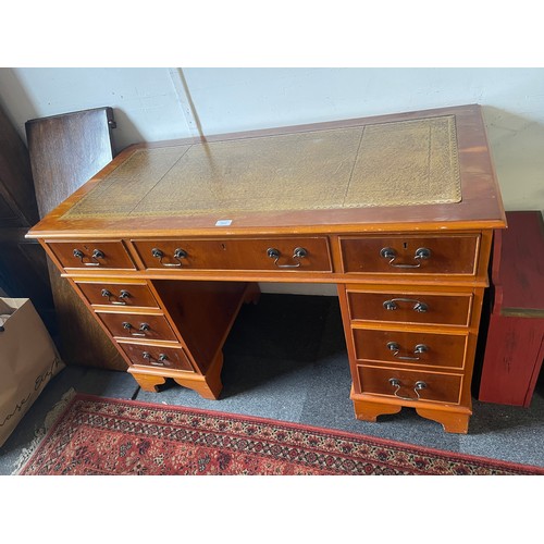 341 - A modern yew finish pedestal desk, with inset top -