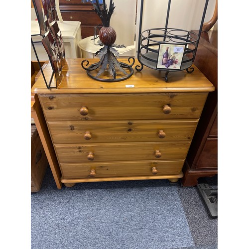 344 - A pine finish chest, of four long drawers -