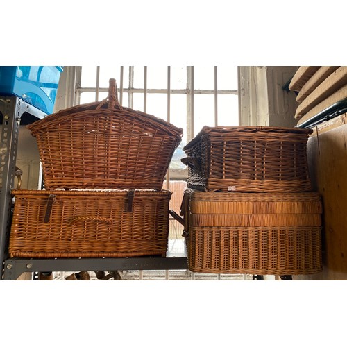 244 - A wicker picnic hamper and three other wicker baskets -