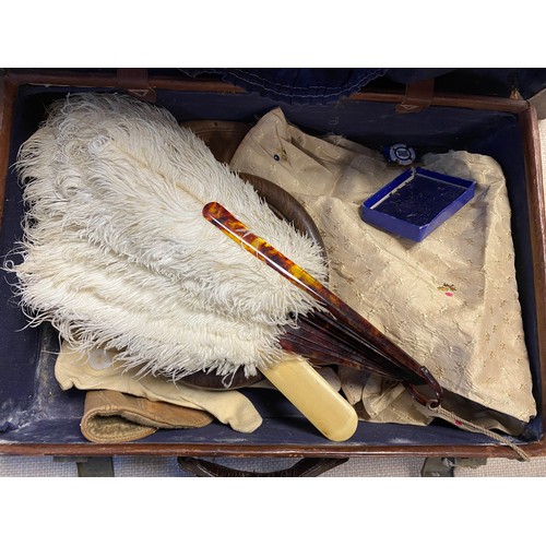 237 - A vintage leather case, together with two satchels, a feather fan, walking stick, etc -