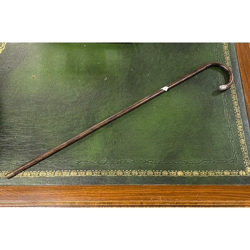 23 - A silver mounted child's walking cane -