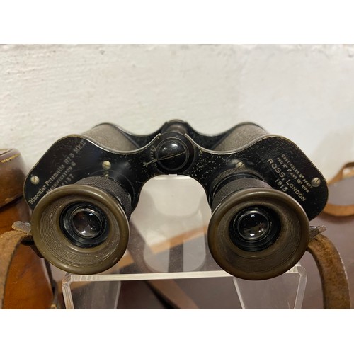 253 - A pair of military issue prismatic binocular, No. 137, by Ross of London, dated 1913, in fitted leat... 