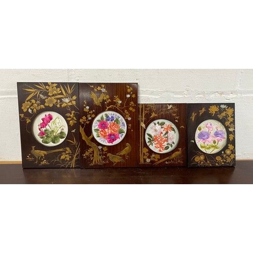 260 - A set of four shibyama style frames, each with inlaid and gilded detail, inset with later tapestry p... 