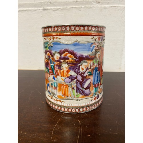 117 - A Chinese export mug, enamelled in the famille rose palette with figures -