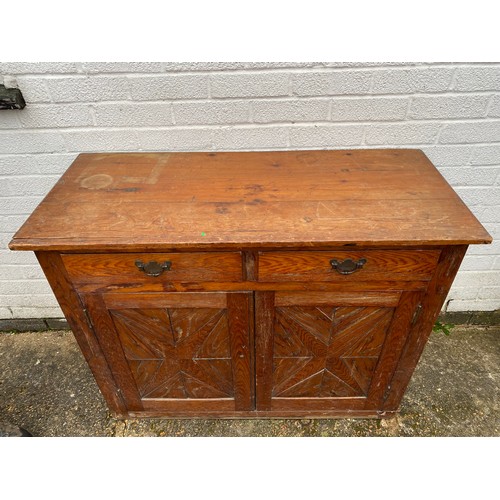 365 - An early 20th century French sideboard, fitted with two drawers over cupboard doors -