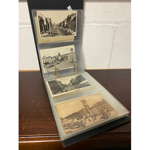 290 - Postcards: two albums, the first album of approximately 220 vintage postcards, mostly sepia titled t... 