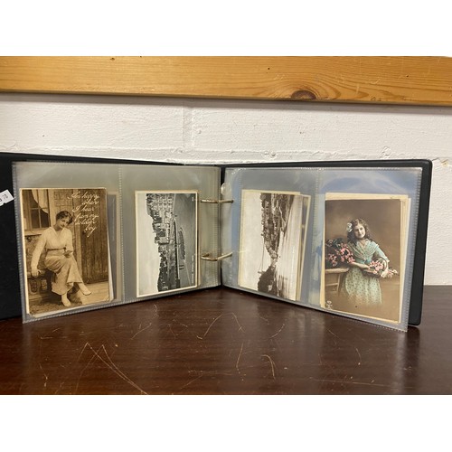 290 - Postcards: two albums, the first album of approximately 220 vintage postcards, mostly sepia titled t... 