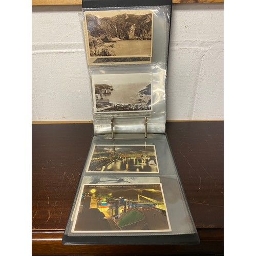 290 - Postcards: two albums, the first album of approximately 220 vintage postcards, mostly sepia titled t... 