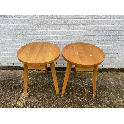 380 - A pair of modern Italian oak occasional tables, each with circular top and drawer -