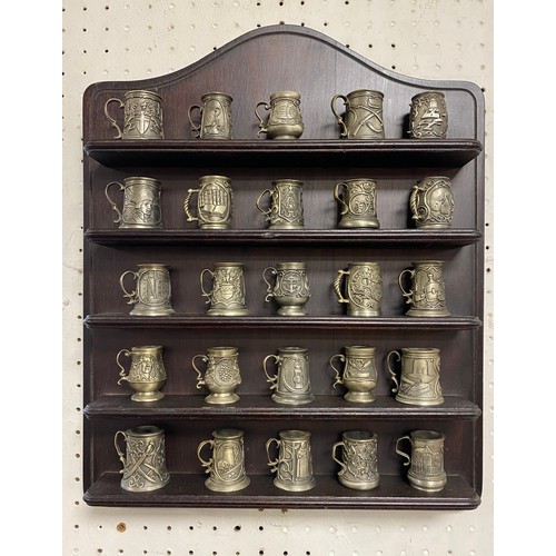 310 - A collection of 25 John Pinches pewter miniature tankards -