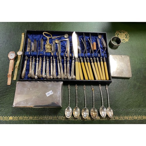 50 - A mixed lot of silver items, including silver handled flatware, cigarette case, two wristwatches etc... 