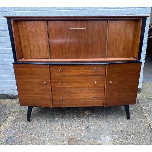 412 - A vintage Beautility cocktail cabinet, with fall front and cupboard doors over three drawers and cup... 