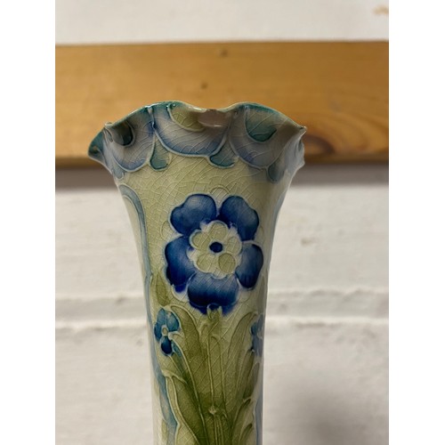 163 - Moorcroft: an early Macintyre Moorcroft vase, painted with flowers (a/f) -