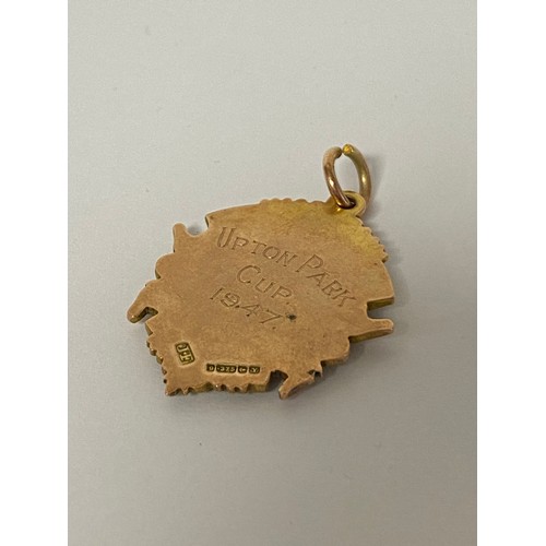 102 - A 9ct gold Guernsey Football Association medal, dated 1947 -