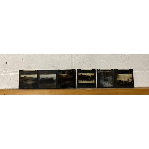 240 - A quantity of glass slides, including American railway/trains, cars cable car etc, together with loo... 